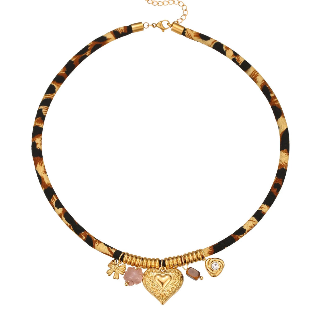 Gold geometric leopard series pendant on an adjustable stainless steel necklace chain.