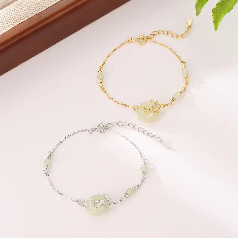 Women's Hetian jade bracelet with Peace Buckle clasp in antique style, made from 925 silver