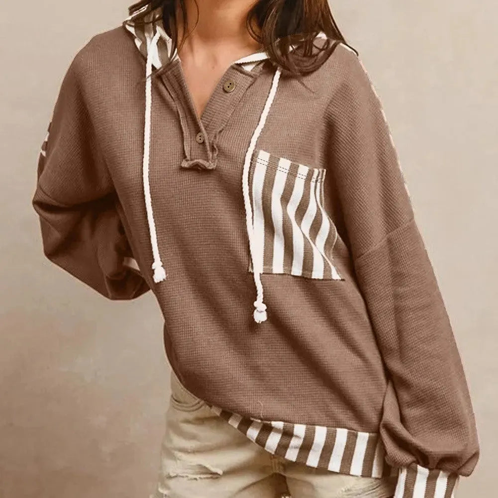 Straw yellow hoodie with waffle texture, striped patchwork design, button neck, and drawstring hood in sizes S M L XL