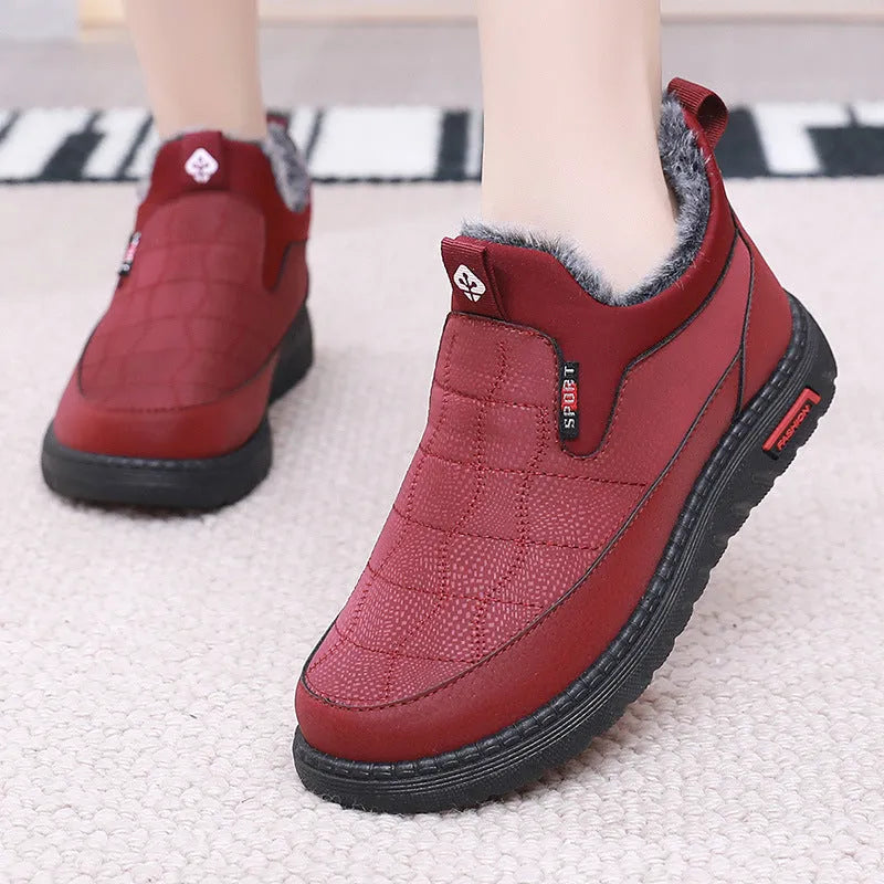Women's black casual flat boots with round toe and non-slip rubber soles
