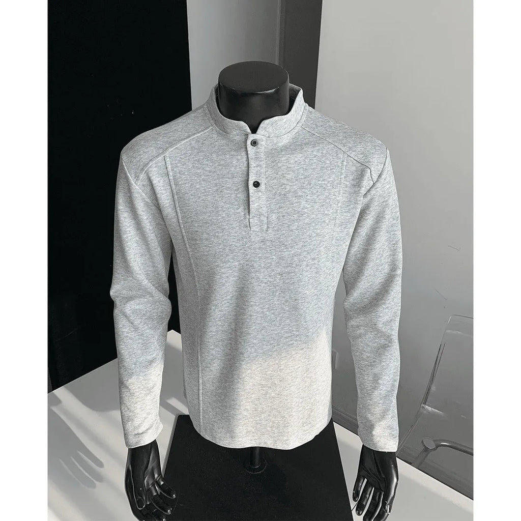 Men's asymmetric patchwork polo shirt with stand-up collar in Chinese cotton, showing loose fit and long sleeves