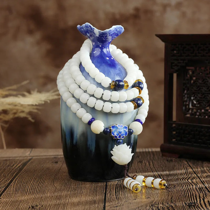 White jade Bodhi bead bracelet for men and women with 6x8mm beads in multiple style options.