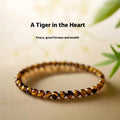 Handmade tigereye stone bracelet with geometric design and round elements in new Chinese style