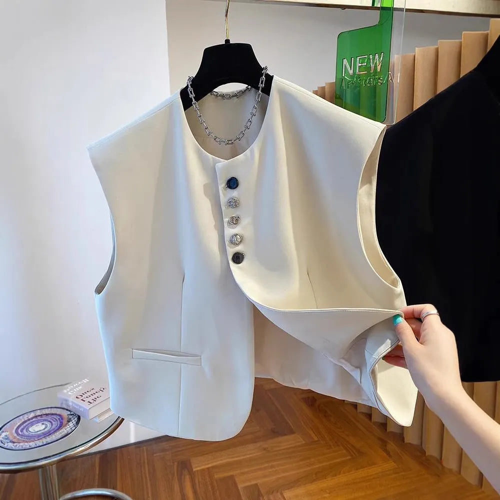 Beige loose-fitting waistcoat dress with side pockets, 40cm length, shown on mannequin