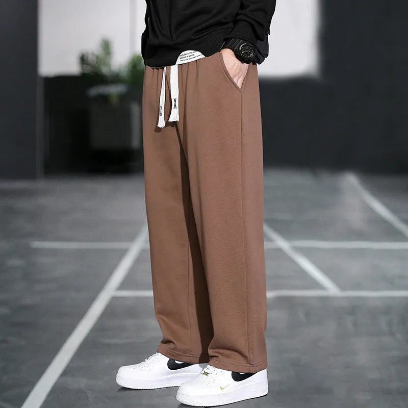 Men's grey bamboo fibre casual sports trousers with a high waist and multiple pockets