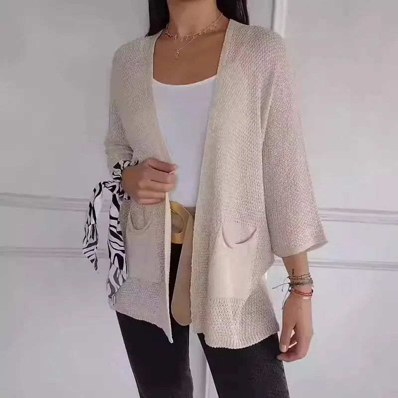 Women's waffle texture cardigan coat in army green with pocket detailing and regular sleeves