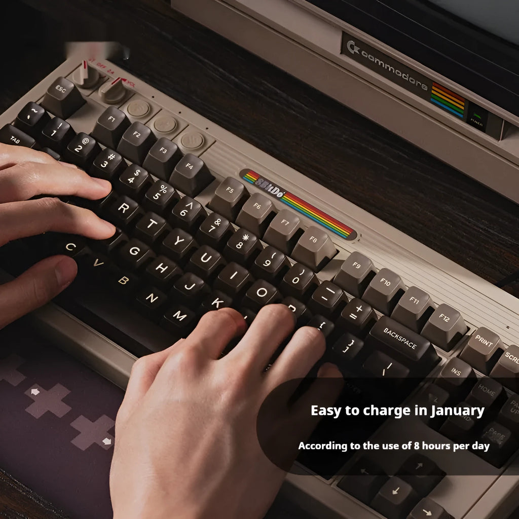 Retro black mechanical gaming keyboard with Bluetooth wireless connectivity and C64-inspired design