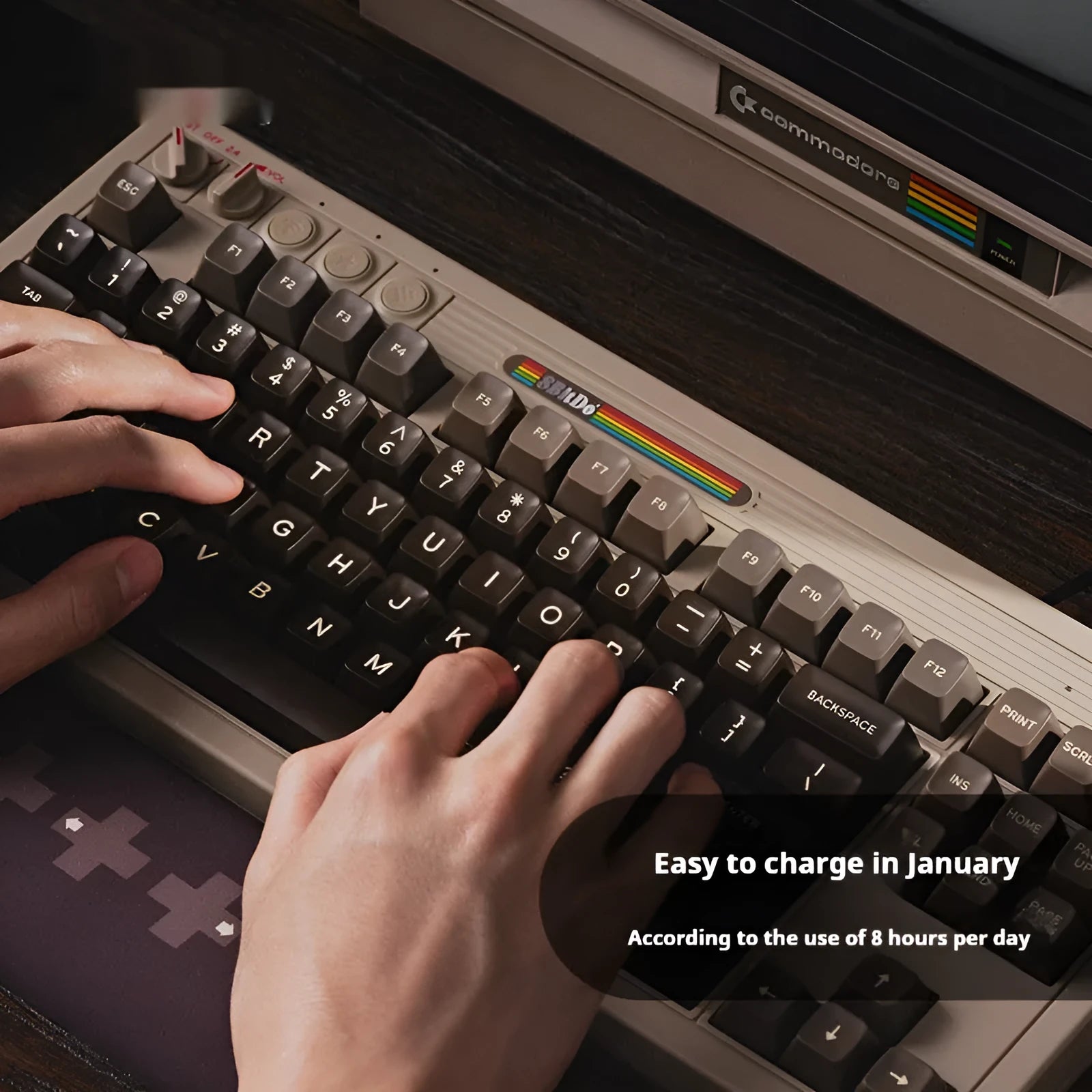Retro black mechanical gaming keyboard with Bluetooth wireless connectivity and C64-inspired design