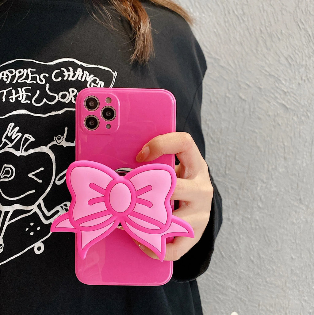 Rose Red iPhone case with pink bow design and a folded-out kickstand on the back.