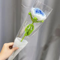 Artificial silk rose bouquet with blue gradient wool-weave petals on a single stem.