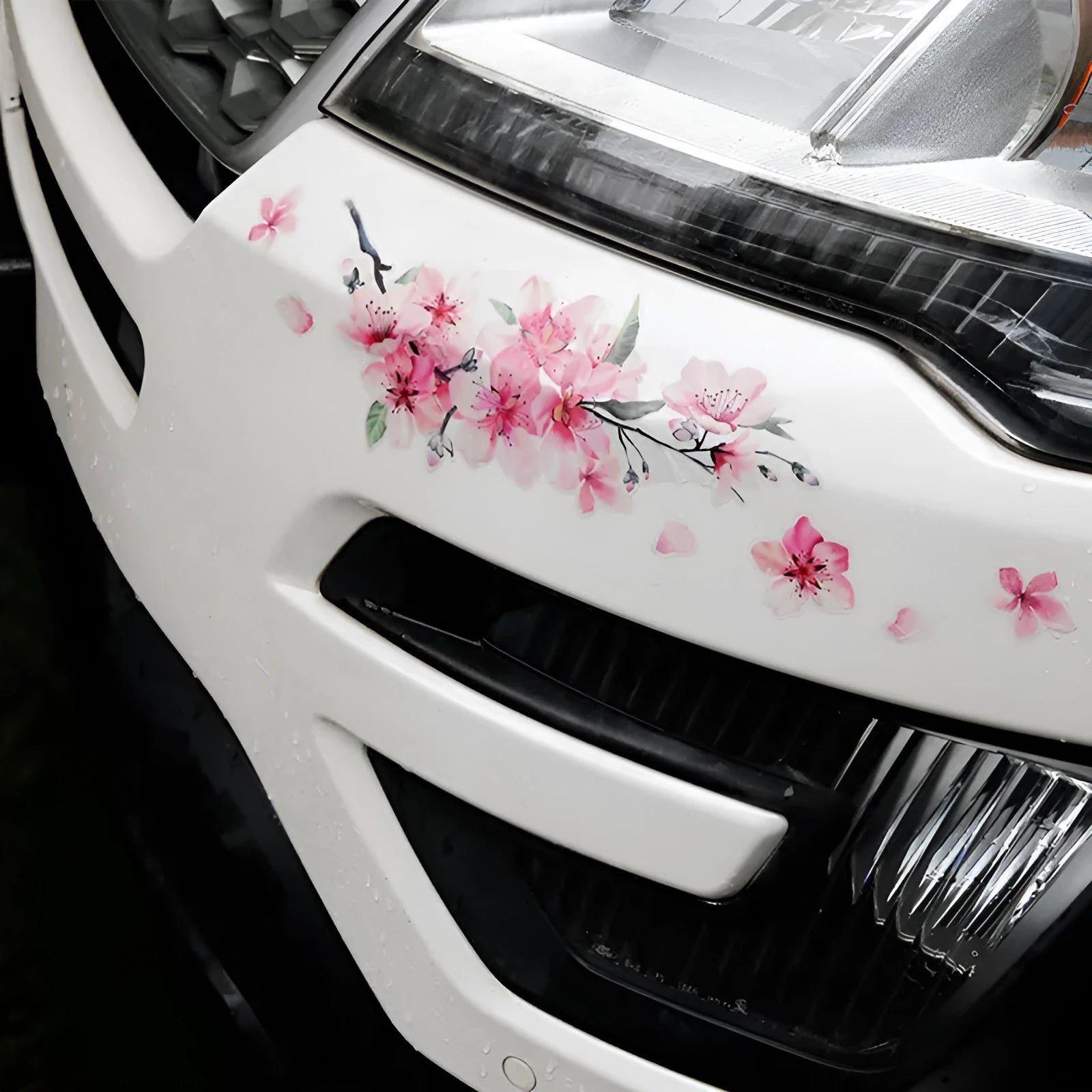 A cherry blossom flower pattern vinyl car sticker on a transparent background.
