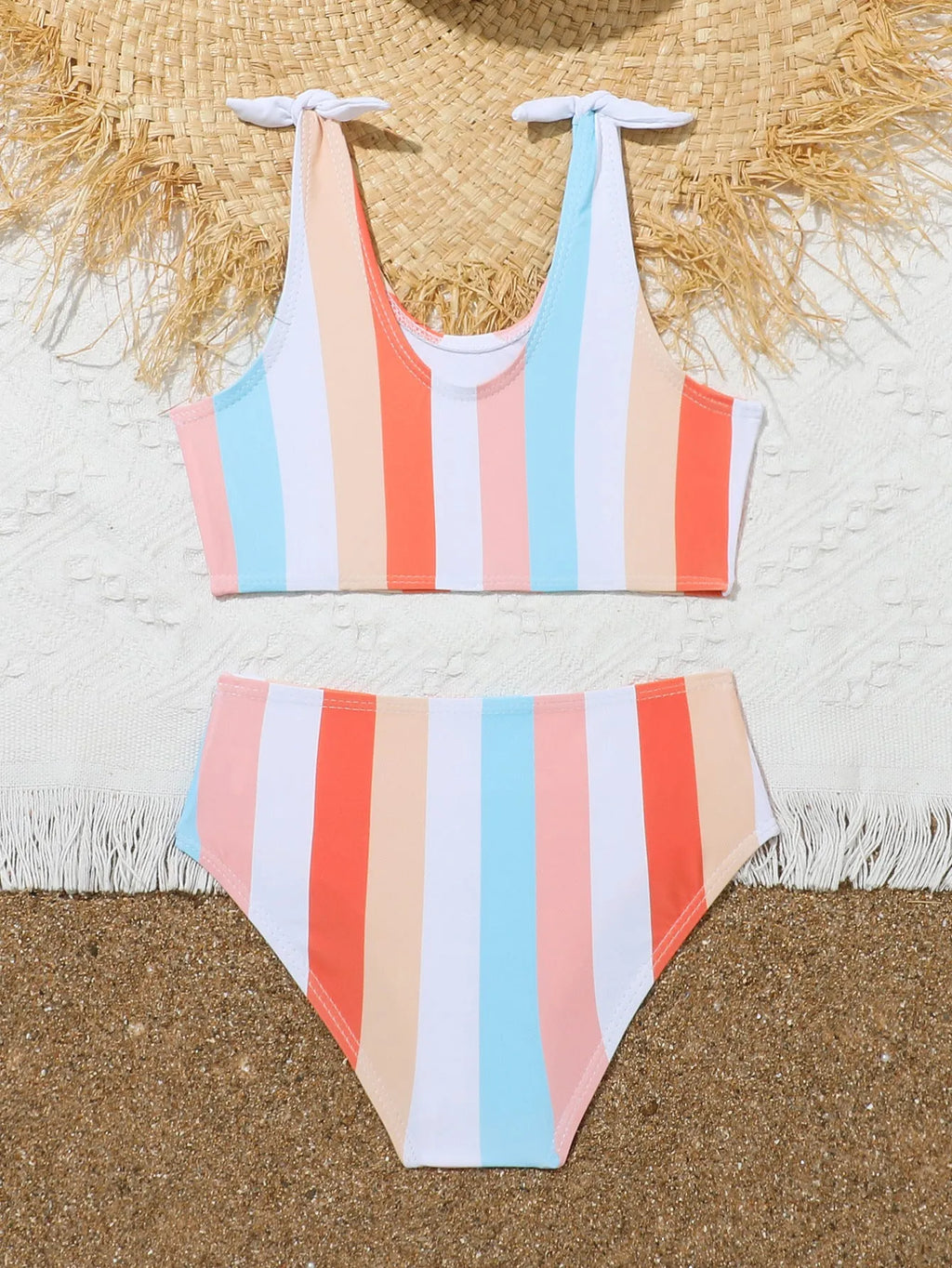 Girls plaid print swimsuit briefs with bra top, shown in multiple toddler and child sizes.