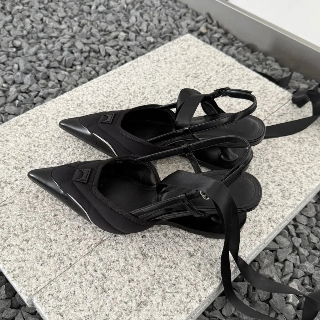 Black women's lace-up high heels with a special-shaped root design on a casual PU sole.