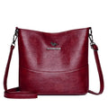 Women's bucket-shaped leather shoulder bag in minimalist style with large capacity