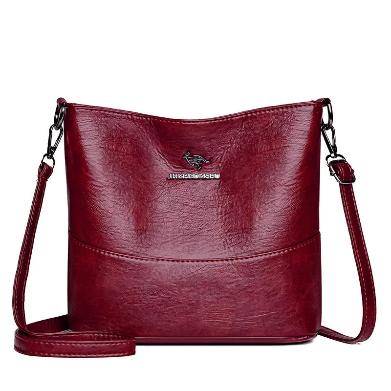 Women's bucket-shaped leather shoulder bag in minimalist style with large capacity