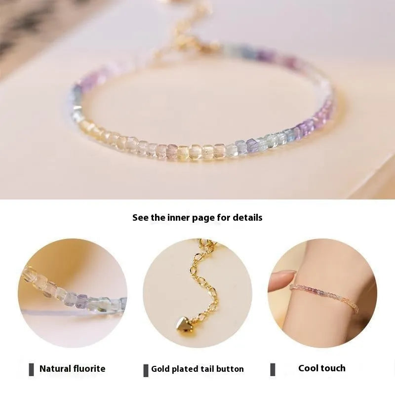 Handmade women's rainbow fluorite bracelet with copper geometric settings