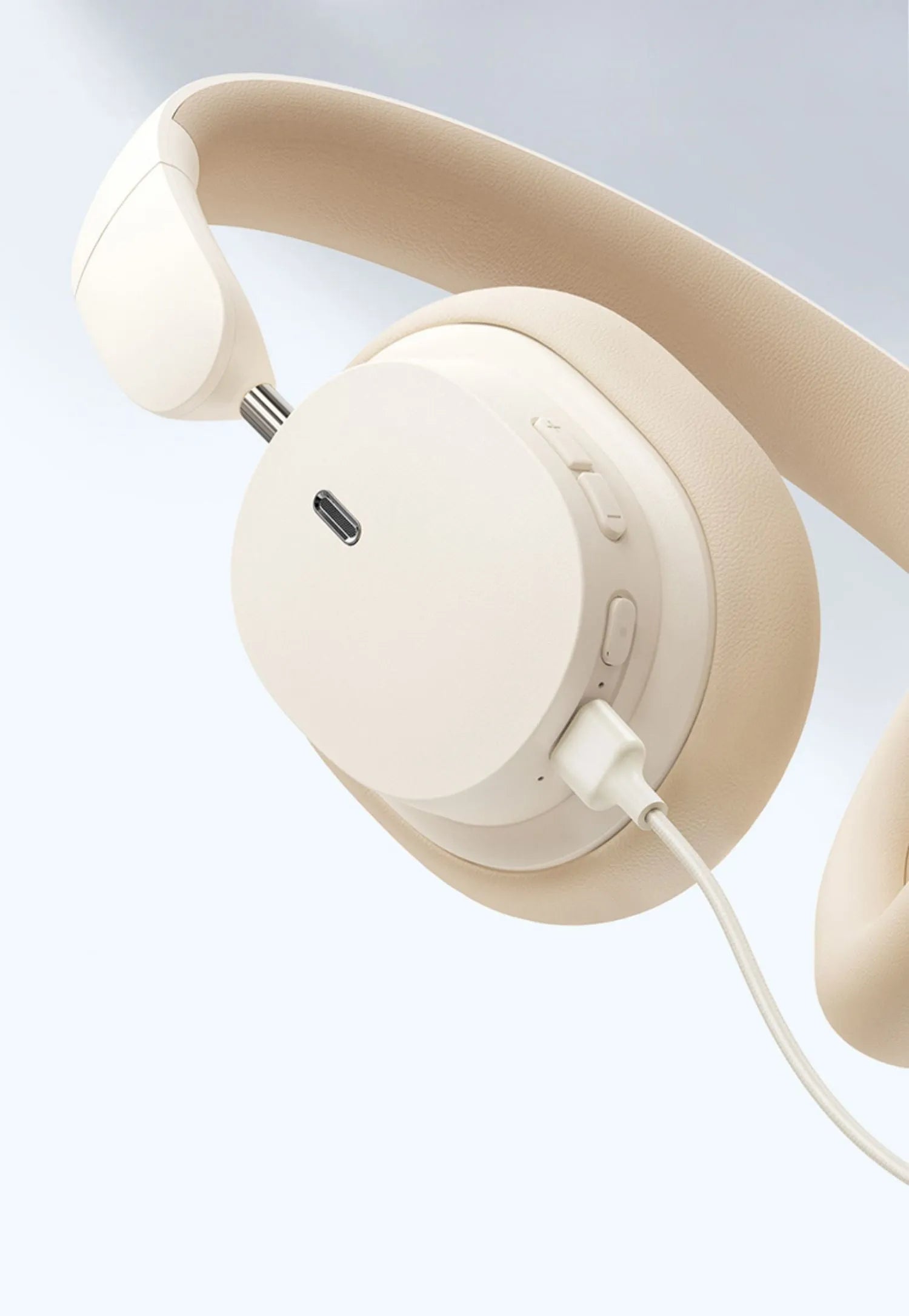 Beige and grey Bluetooth head-mounted earphones with 70-hour battery life and noise cancelling