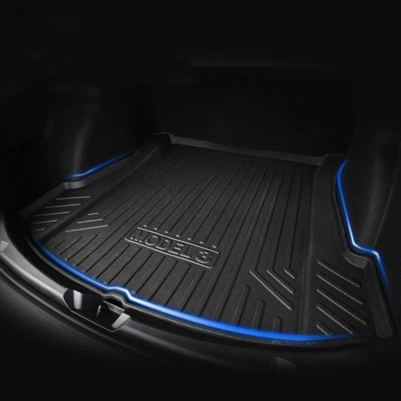 Rubber floor mats for Tesla cars with TPE footrest, custom-fit to Model 3, Y, S, X interiors, showing non-slip backing and textured surface