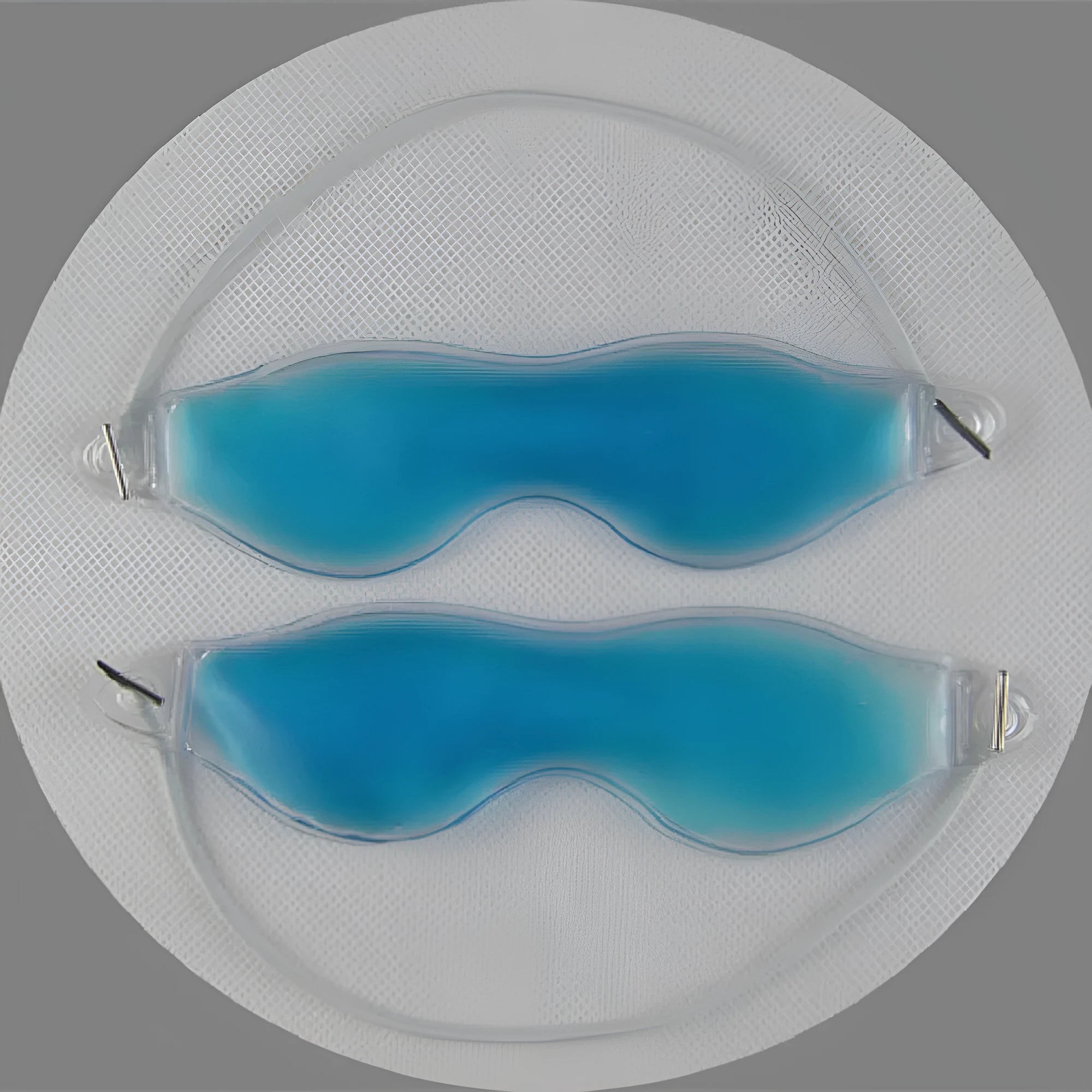 A blue gel ice eyeshade mask for cooling eye relief, shown with green, red, and yellow colour options.