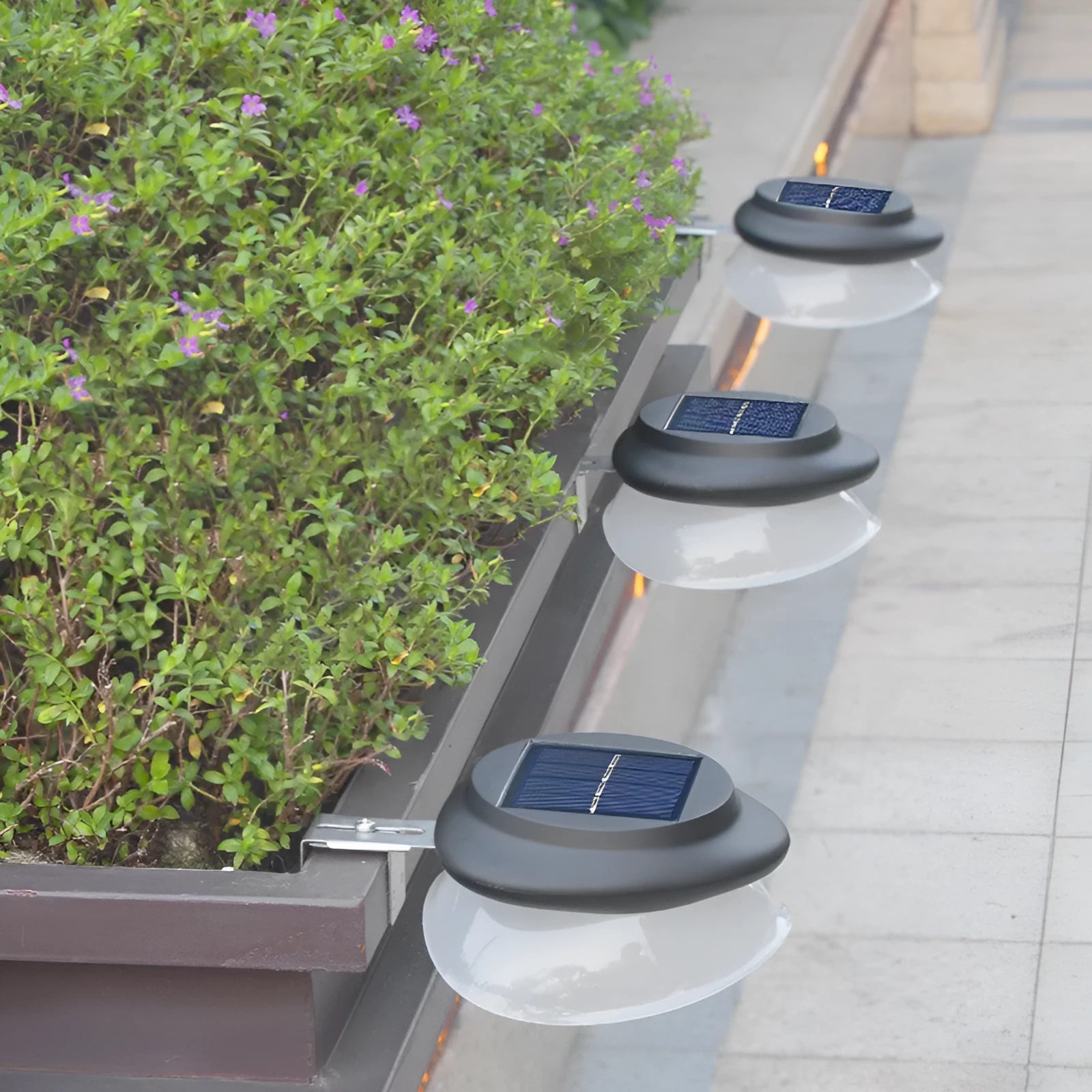 Solar-powered outdoor fence wall lamp with Southeast Asian design in black or white shell options