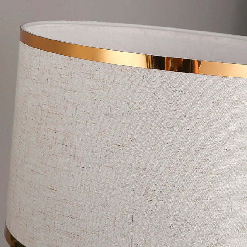 Simple bedroom desk lamp with fabric shade and iron body in black, gold or white finish