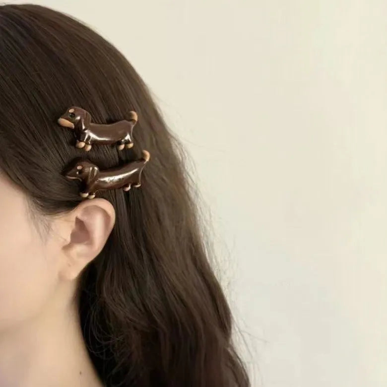 Cute dachshund dog design hair clips with an electroplated finish, shown as a single barrette.