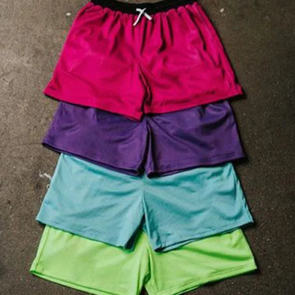 Men's mesh quick-drying shorts in black, featuring a solid colour design and mesh lining for athletic use