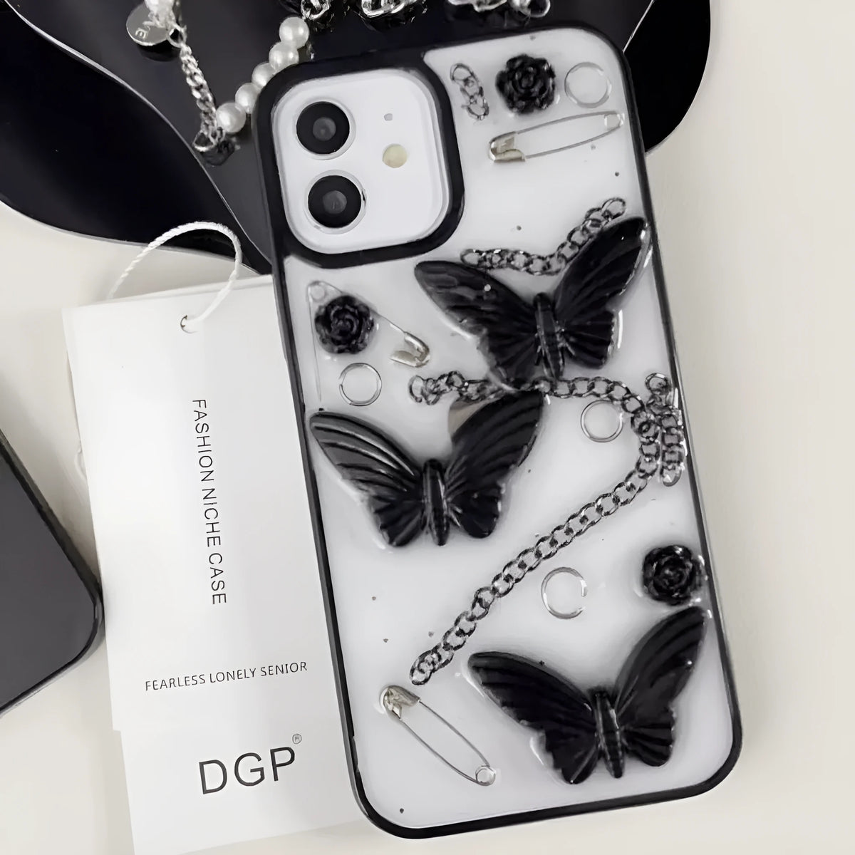 Dark wind 3D butterfly phone case with black bow and drop glue texture for Apple iPhone models.