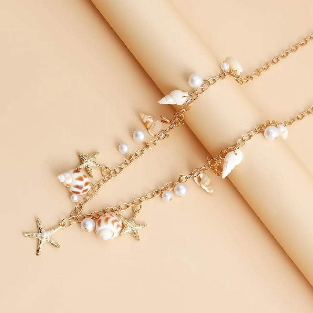Adjustable women's waist chain with matching bracelet featuring star design elements in alloy material