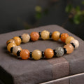 Hetian Natural Jinsi Jade Pumpkin Beads Bracelet with geometric patterns and lotus beads