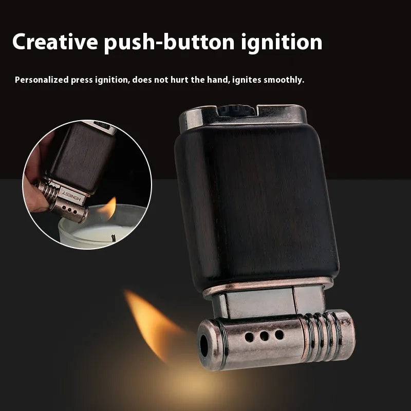 Ebony gas lighter with black wood body and rosewood decorative accents including sun surface and good luck designs