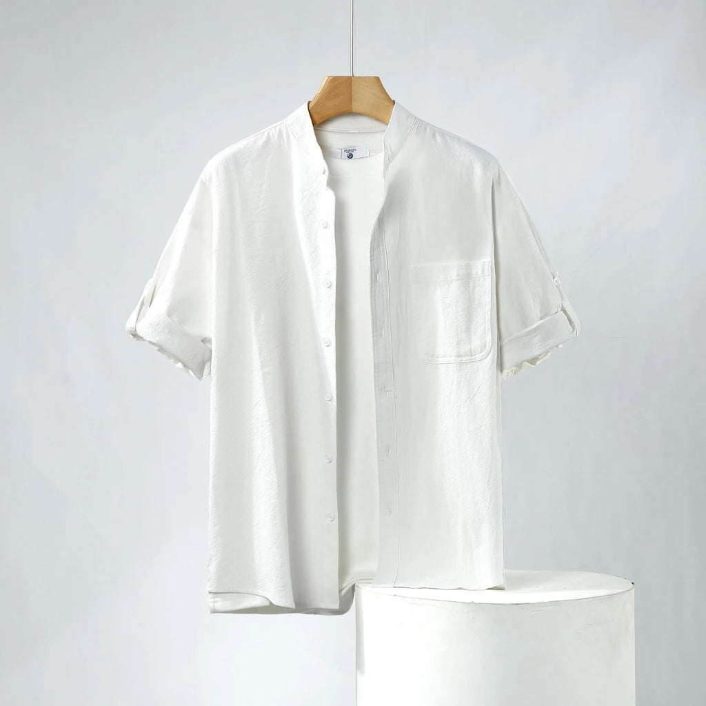 Men's loose fit linen short-sleeve shirt in a solid colour with a simple stand collar.