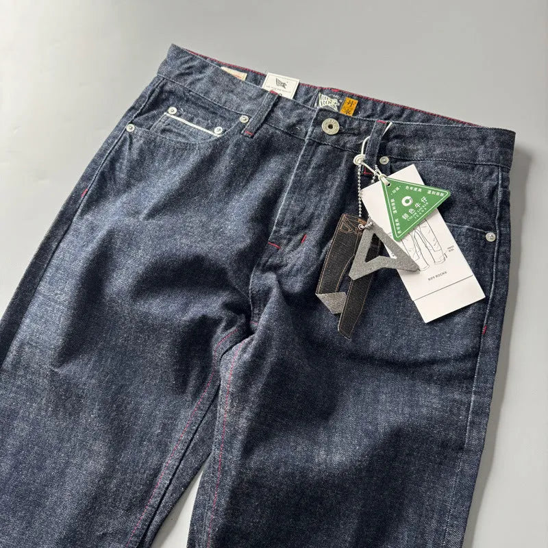 Men's straight-leg denim trousers in primary colour with mid-waist design and straight leg cut
