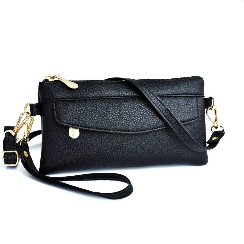 Soft PU leather crossbody bag in pine leaf green with a horizontal square shape and shoulder strap