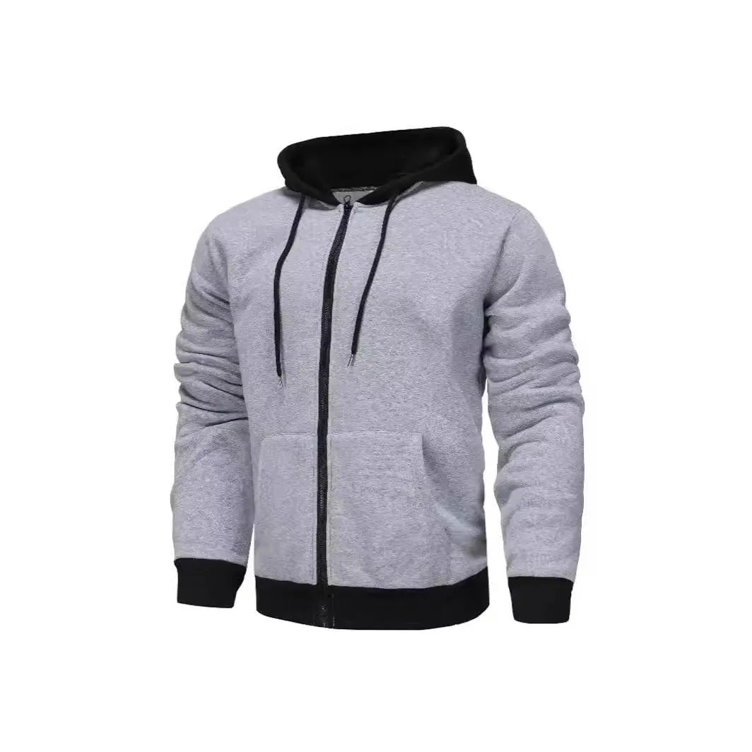 Man wearing a zip-up hoodie cardigan with a hood and patch pockets in a two-tone colour combination.