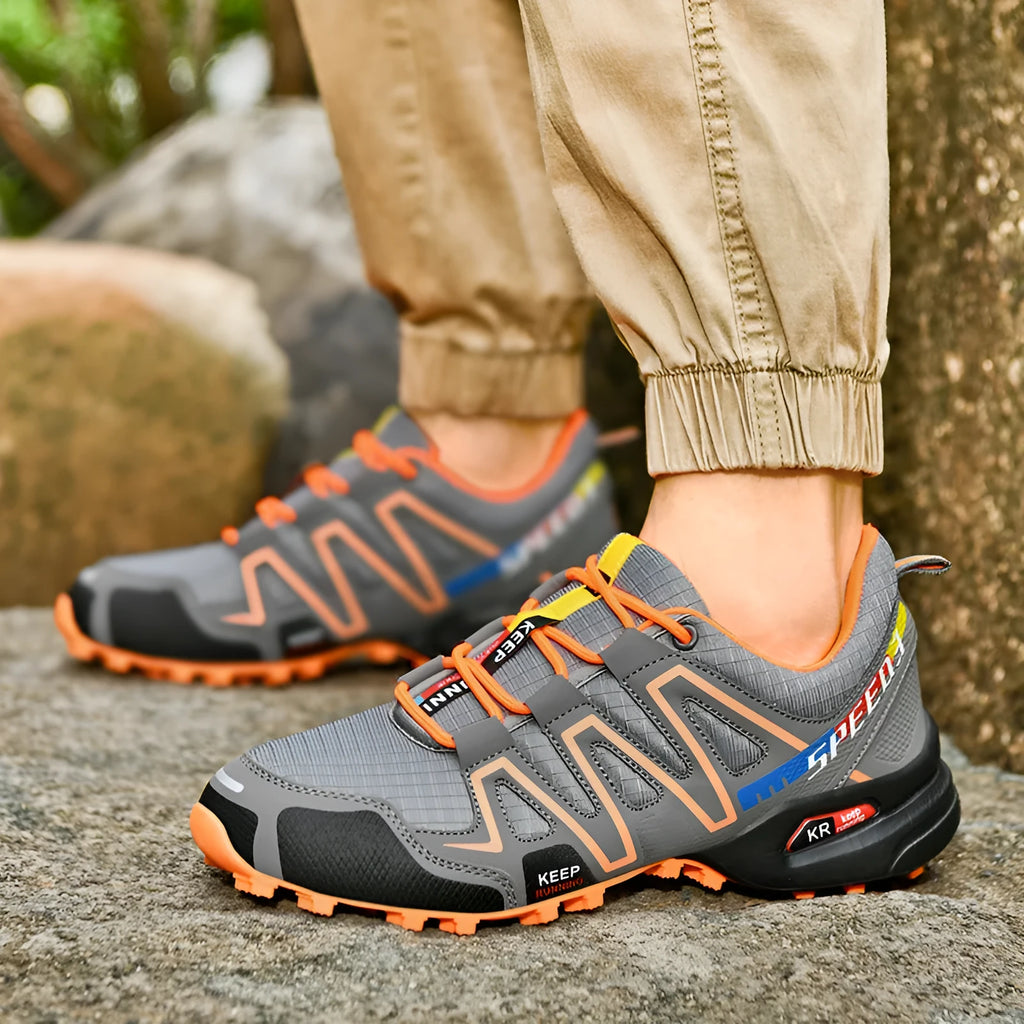 Men's plus size casual running shoes in black and white colour with a low-top design and rubber sole