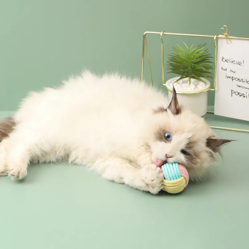 Handmade blue powder, green blue, and pink green cat hair ball plush toys for interactive play