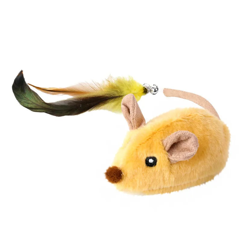 Grey charging mouse cat toy with double feather tail decoration on floor