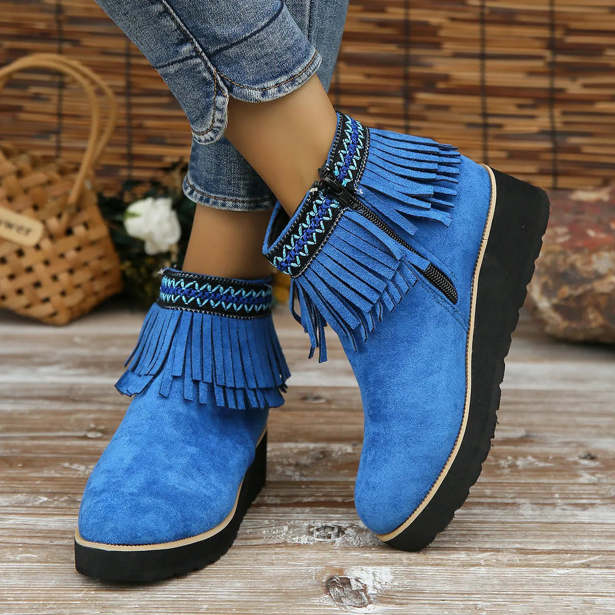 Women's suede wedge bootie in dark brown with side zipper and tassel detail on a 4cm rubber sole