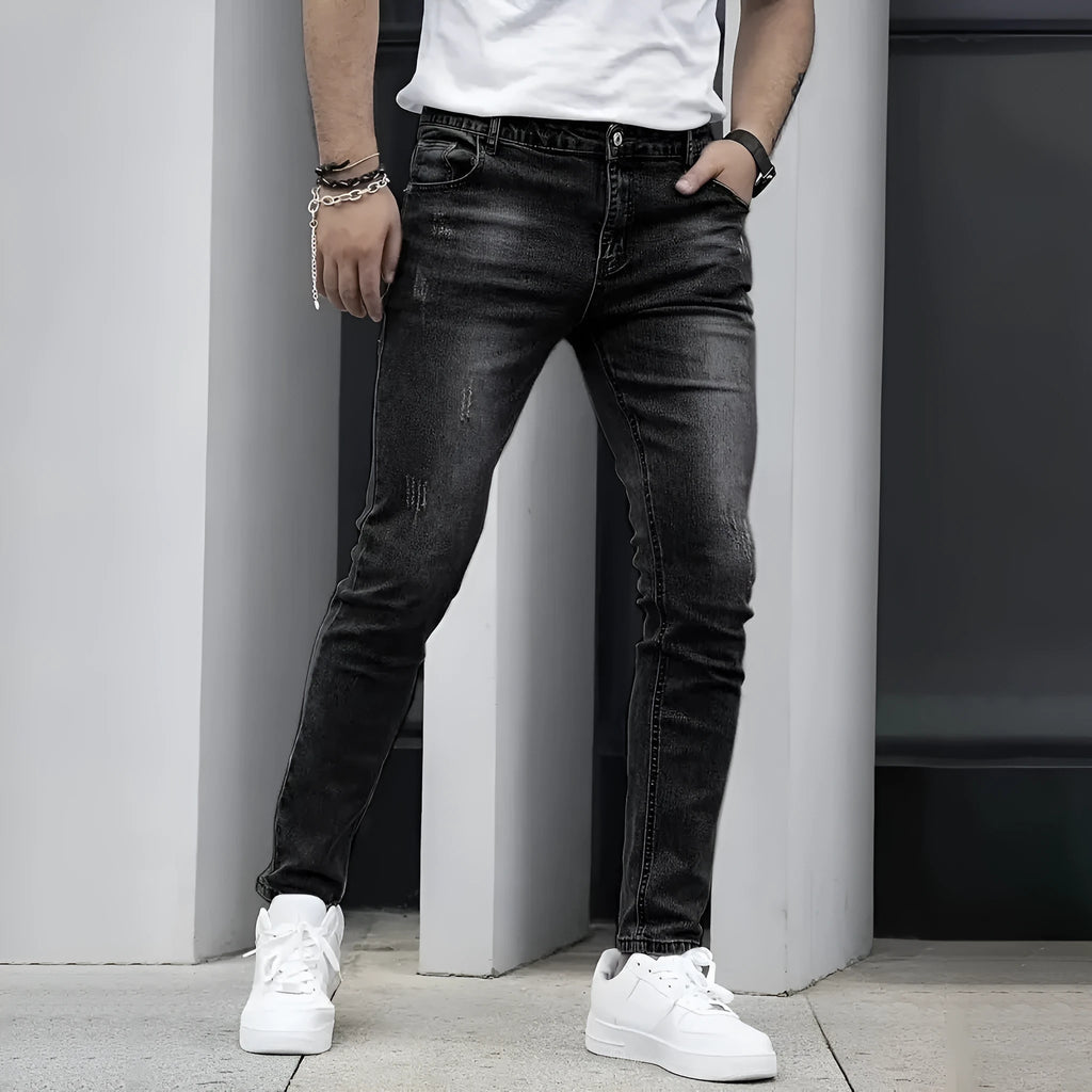 Men's slim straight stretch jeans in black cotton fabric with mid-waist and zipper fly