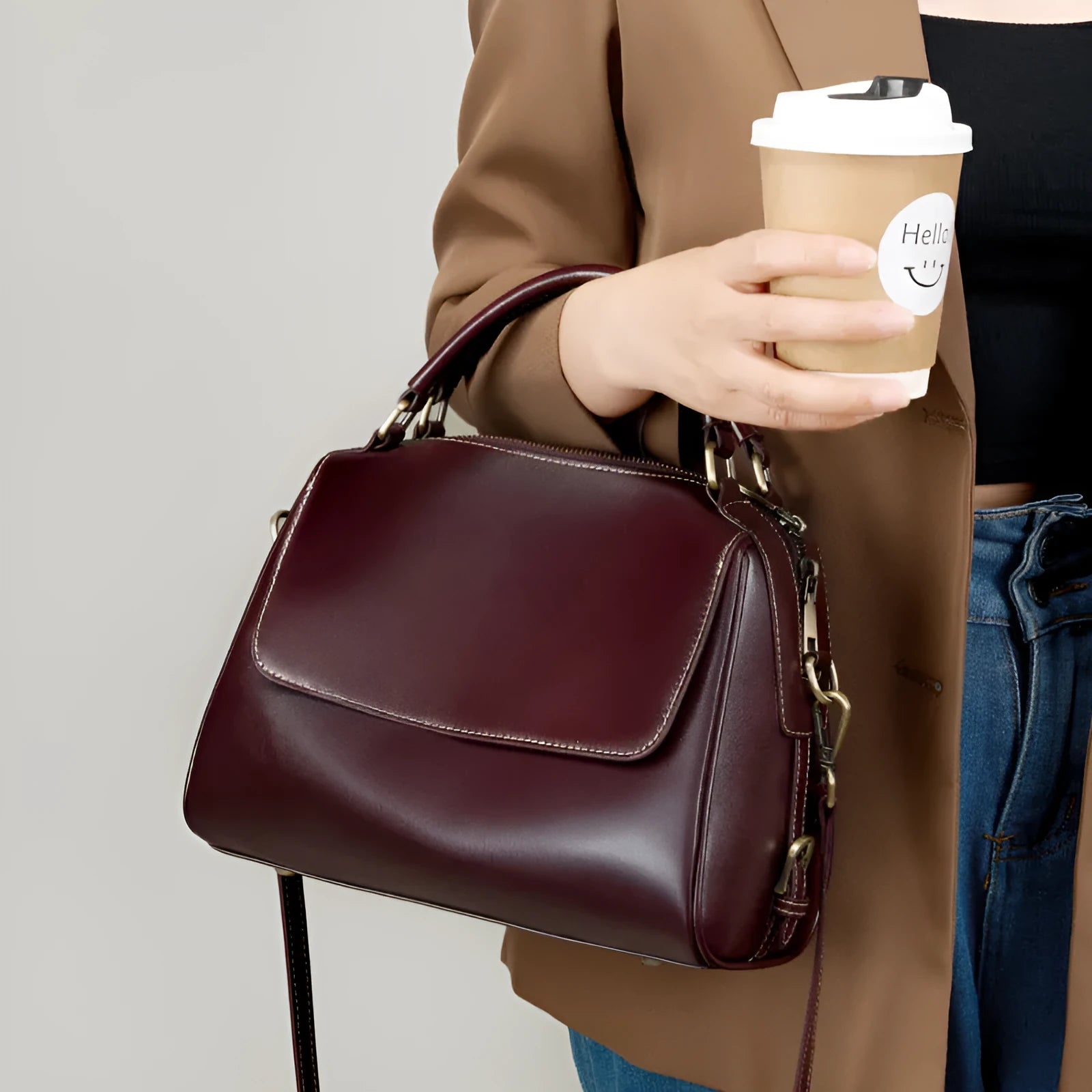 Women's soft genuine leather crossbody tote bag in apricot colour with slit pocket and double straps