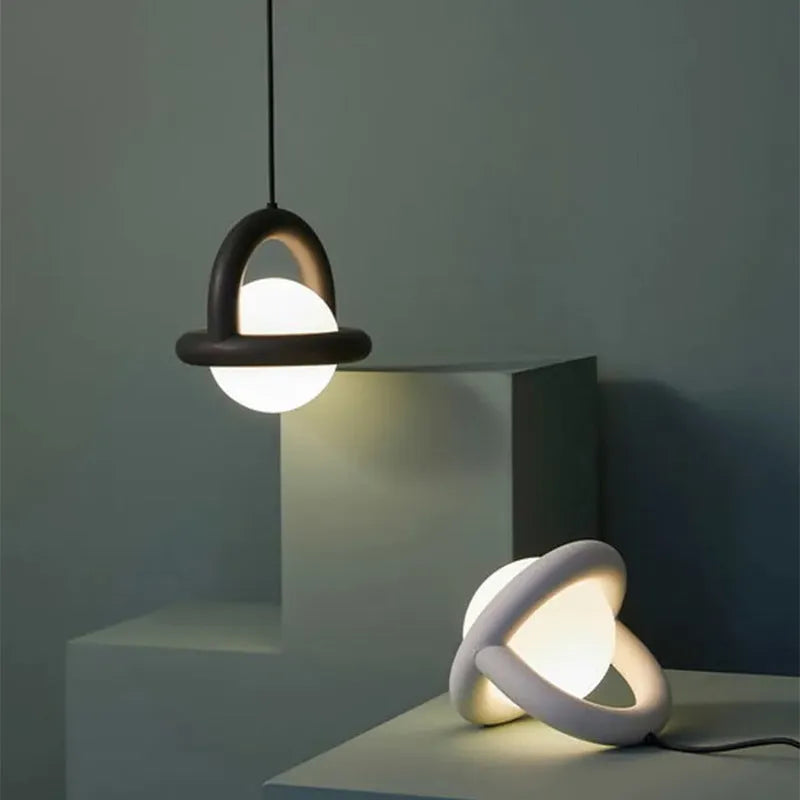 Adjustable hanging line lamp with metal shade in choice of colours, suspended over bedside table with adjustable height for bedroom lighting