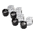 Handheld metal and optical glass magnifying loupe for jewellery and coin inspection.