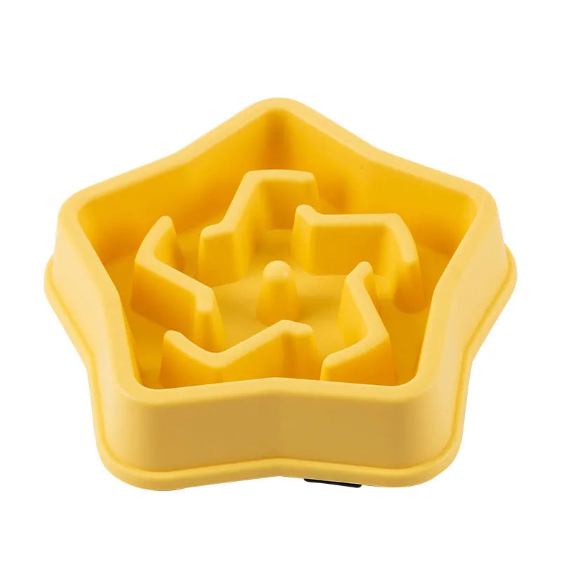 Yellow plastic slow feed dog bowl with textured bottom to prevent choking