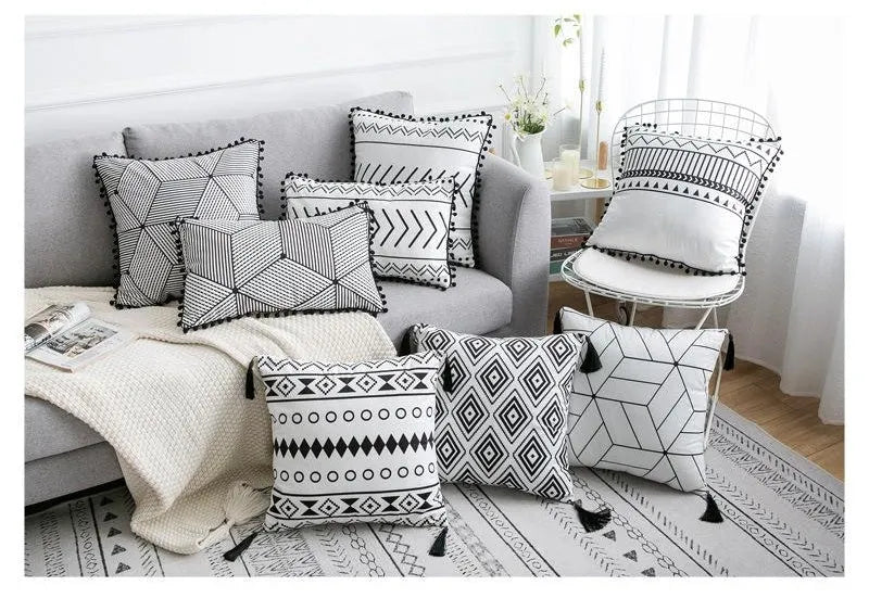 Bohemian National throw pillow in light grey colour with 30x50cm rectangular shape on living room sofa