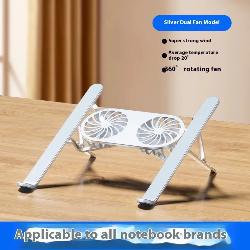 Silver aluminium laptop stand with twin cooling fans in folded position beside laptop