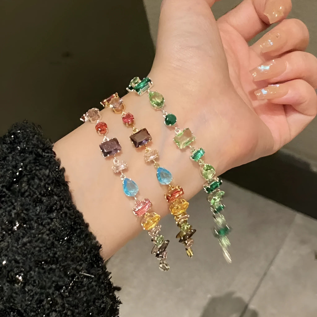 Irregular geometric zircon drop-shaped copper bracelet in gold or silver tone with coloured zircon inlay