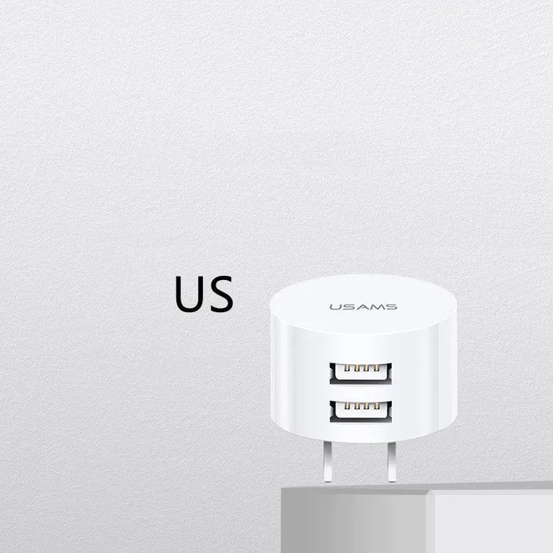 White portable USB phone charger with universal international adapter for UK US and EU power sockets