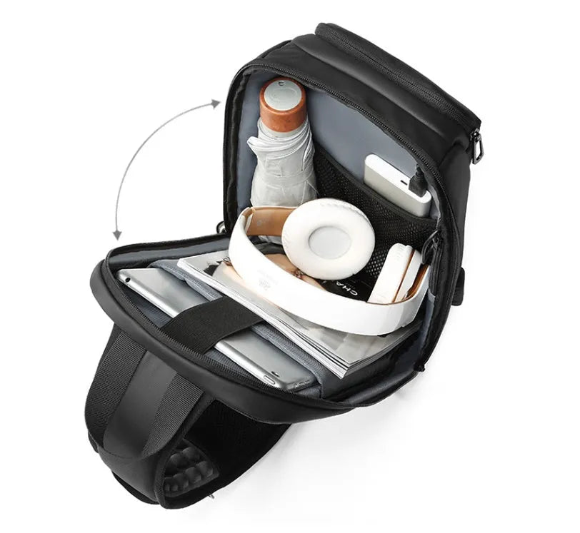 Black outdoor shoulder bag with air cushion strap and internal organisation compartments