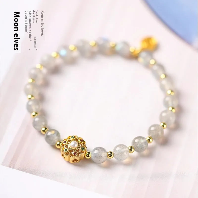 Hand-woven crystal bracelet with grey moonstone, pink sunstone, and peach strawberry quartz 6mm beads